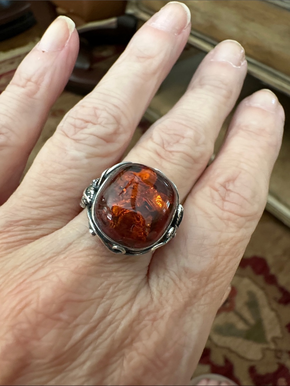 Sterling Silver Ring with Deep Orange Amber Cabochon